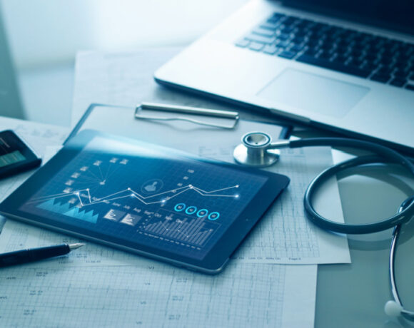 Digital health concept. Laptop, tablet, mobile and stethoscope placed on the table.