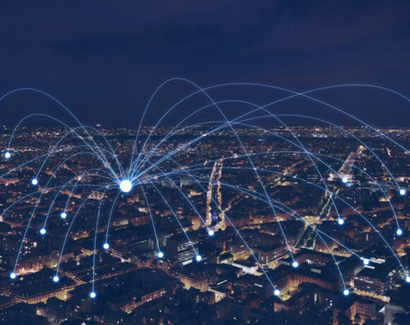 Double exposure image of network communication or distribution concept, connection line from central point over night city.