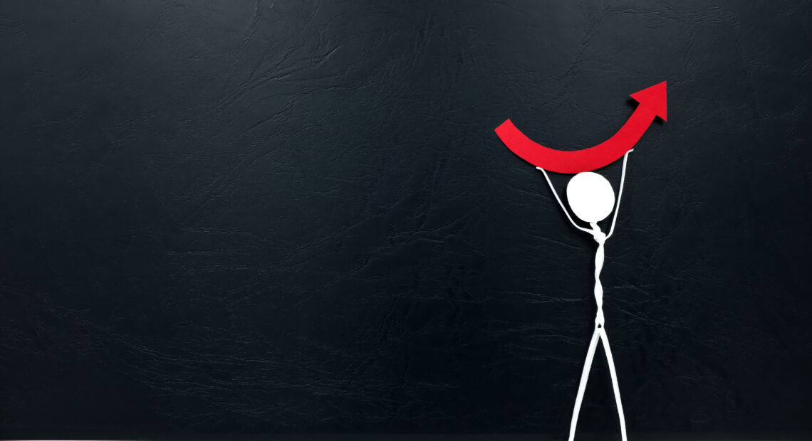 A stick man figure holding a red rebound arrow symbolizes the economic recovery concept.