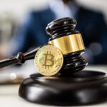 Judge gavel with Bitcoin illustrates the Bitcoin Crypto Regulation And Law.