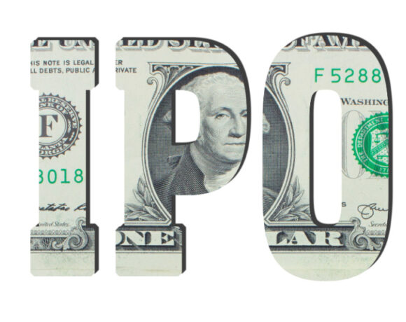 The IPO battle in the fintech sector is illustrated by IPO letters with money texture of American dollar banknotes.